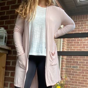 A pink athletic cardigan